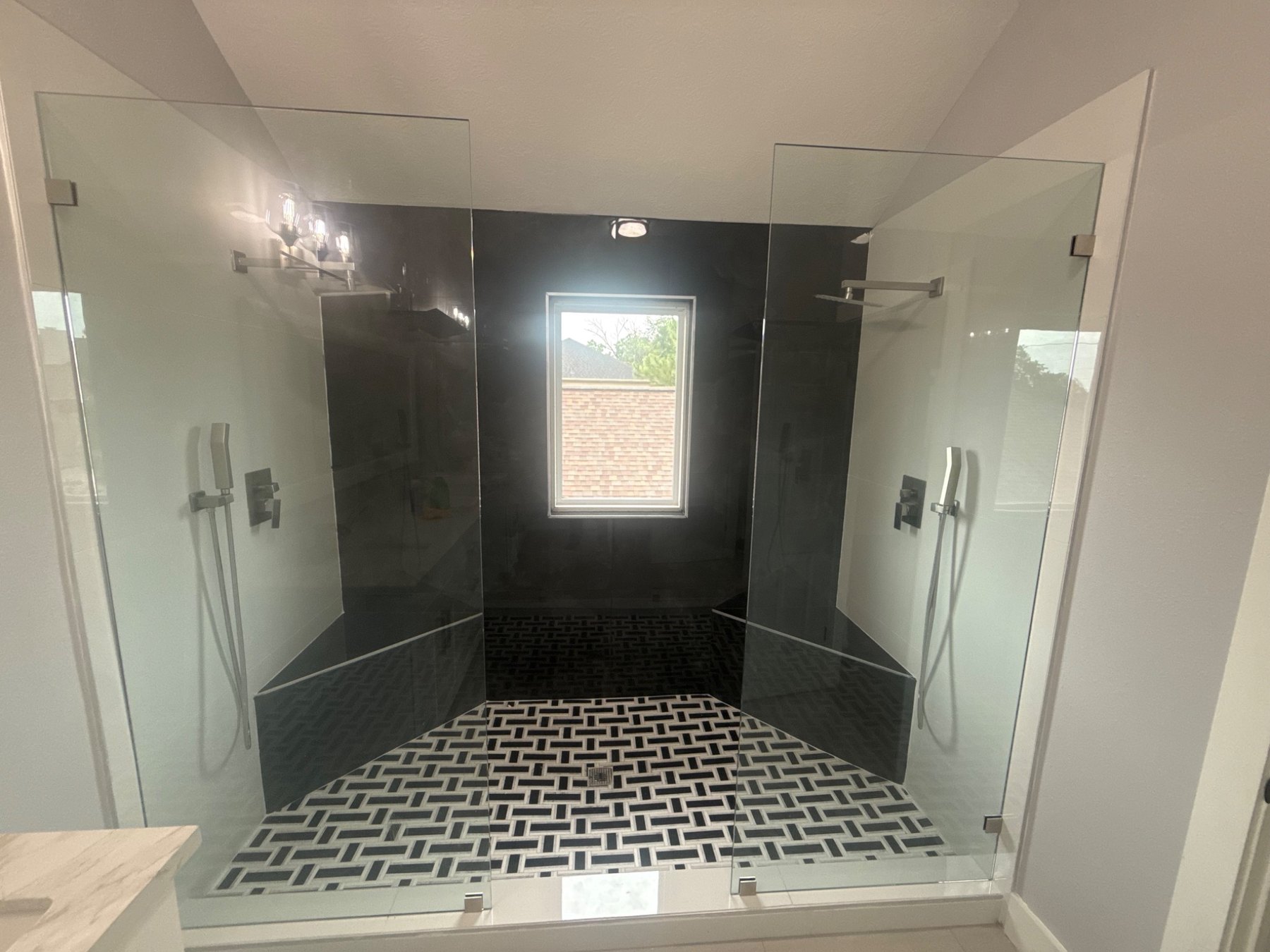 Large custom shower with dual fixtures